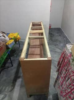 wood made counter. with mirror