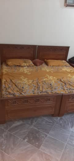 used single 2 beds without mattresses