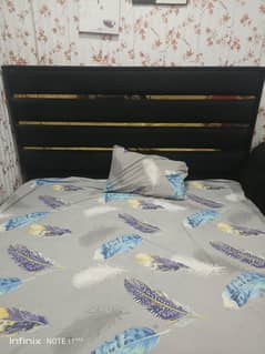 double bed with side tables