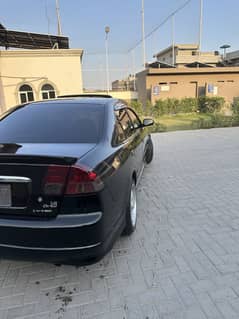 Civic 2005 model manual sunroof