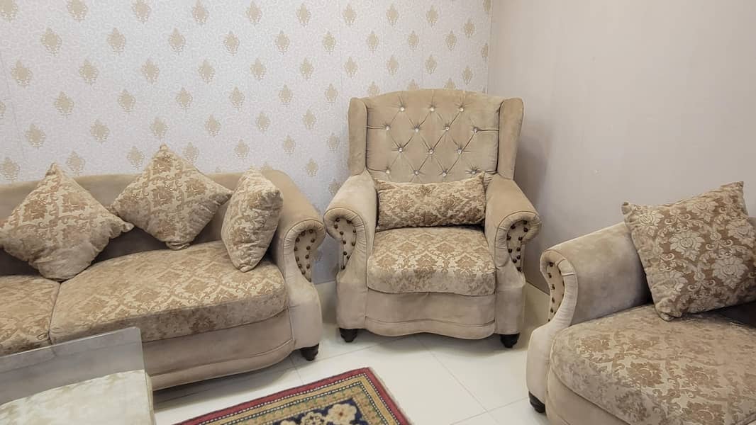 7 seater sofa with table and 4 stools 2