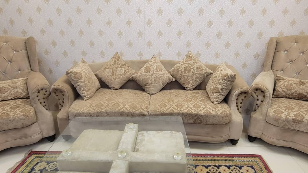 7 seater sofa with table and 4 stools 3