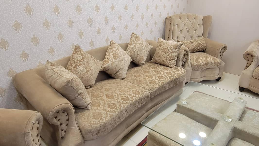 7 seater sofa with table and 4 stools 6