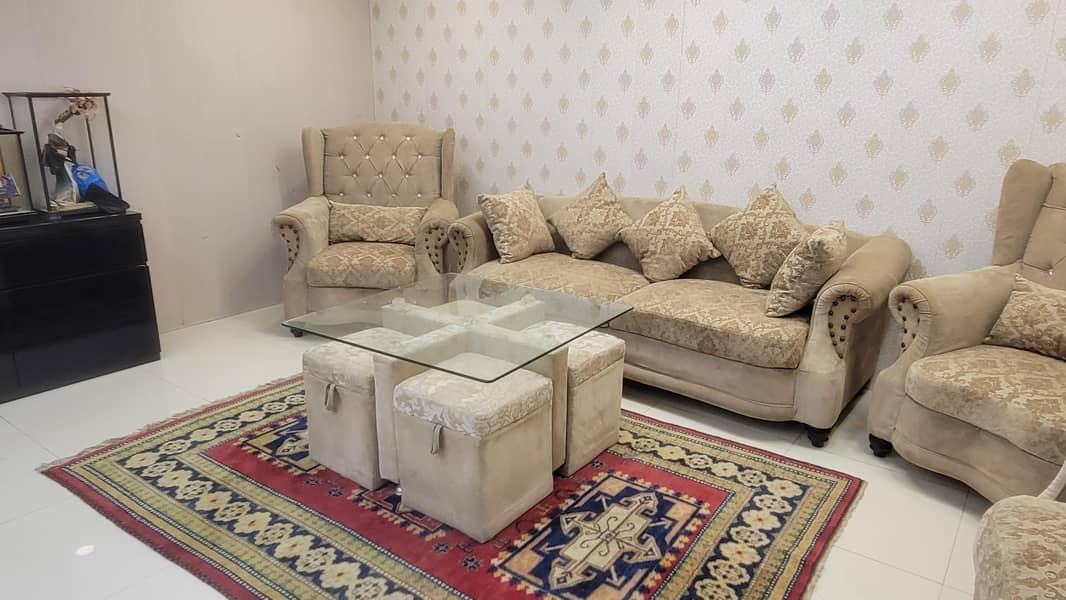 7 seater sofa with table and 4 stools 8