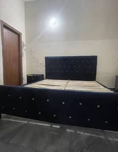 Bed and sofa with side tables