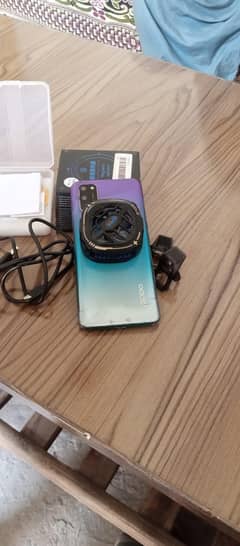oppo a52 with cooling fan fresh condition used it 2/3 days only
