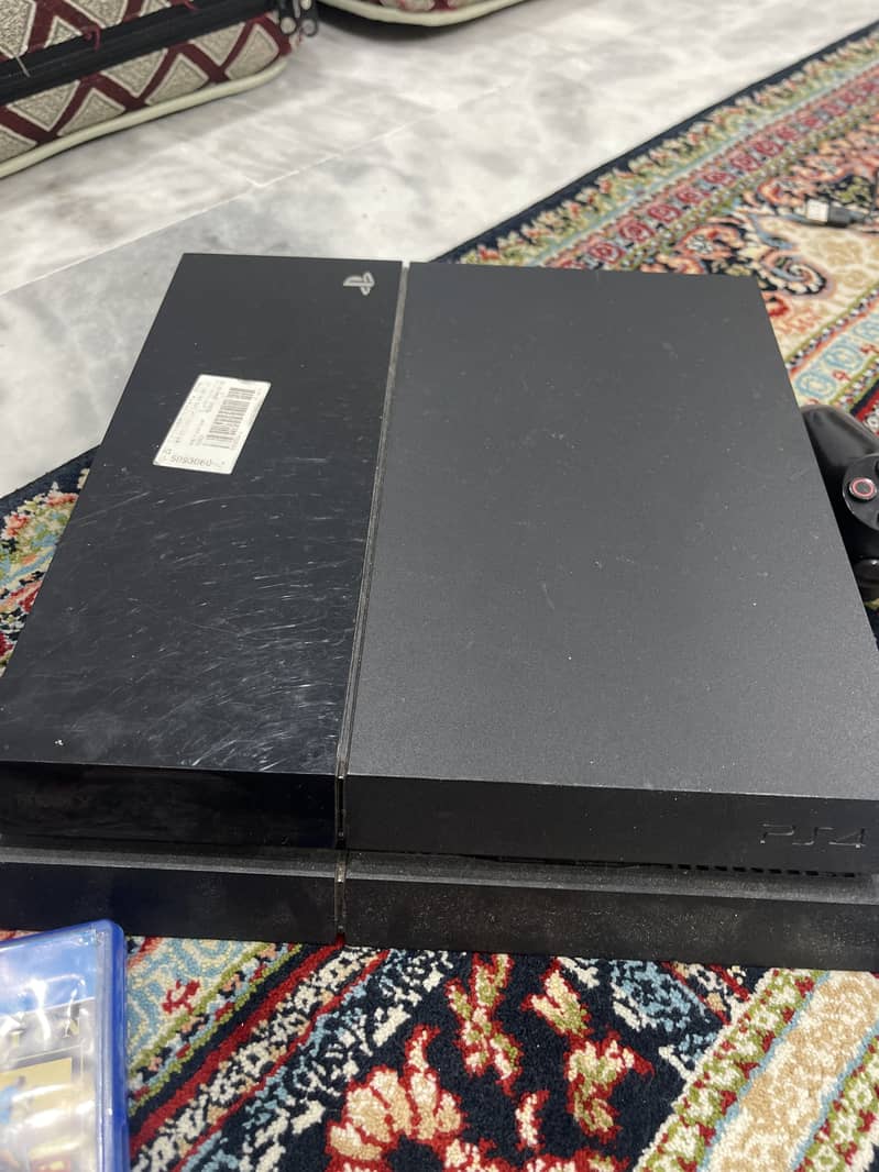 ps4 used , two controllers and one game gta 5 full new condition 1