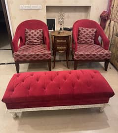 Sofa chairs with bench and center table