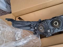 2016 model GLI front left side headlight and bonut