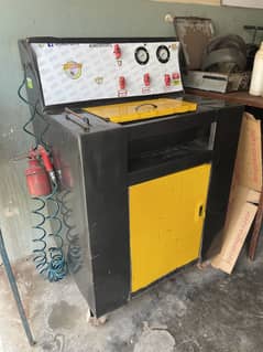 Catalytic converter cleaning machine