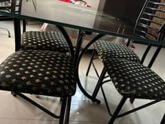 Metallic dining table Nd chairs