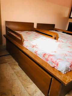 2 wooden single bed with mattress