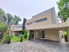 2 kanal modern bungalow with straight line front elevation available for rent in DHA phase 05