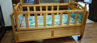 Wooden baby cradle