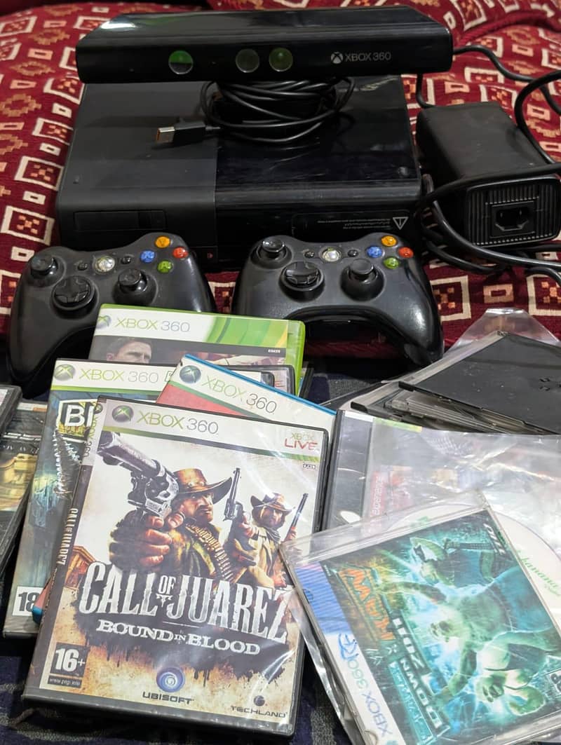 Xbox 360 E with 2 orignal controllers and Kinects 0