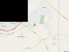 "Plot No. 307, Block E: Your Vision of Grand Living in DHA Phase 6"