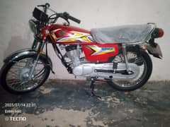 Honda 125 in the red color  with 10 by 10 condition  2024/2025 model
