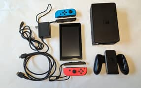 Nintendo Switch + Games + Official Wireless Pro Controller