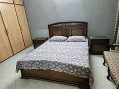 Queen size wooden bed