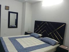 Double bed with mattress and mirror