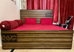 King size bed with side tables and dressing