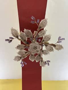 The unique floral design with purple accents adds aesthetic value.