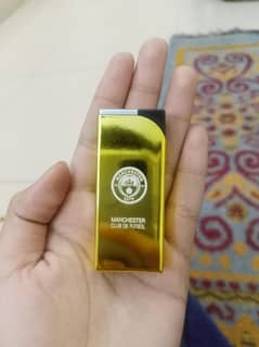 Premium lighter refillable  golden colour  plastic body