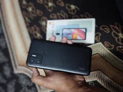 Redmi A2+ with box and charger