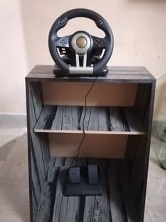GAMING WHEEL WITH BOX AND TABLE AND PS4 GAME CDS
