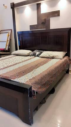 Double bed with Double mattress and one side table