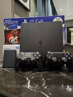 PS4 slim with 2 original controlers