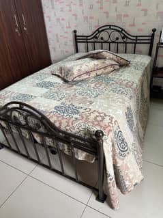 heavy 18 gauge single bed with mattress.