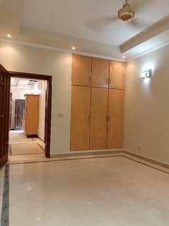 10 Marla ground floor VIP location, Rive Block, Near Market, Near Park, near mosque two bedrooms, three bathrooms, okay security system, carpeted road.