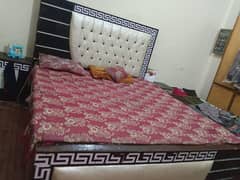 king size bed with side tables and dressing table