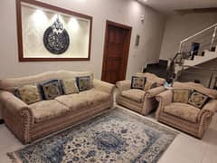 Strong 5 seater sofa and rug in good condition.
