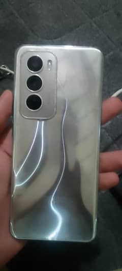 oppo reno 12 5g   12/512  new devide in wprronty