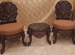 Wooden crafted chairs with table