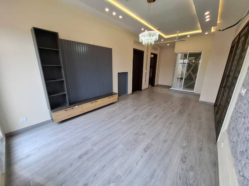 Elegant Triple-Story 10 Marla Home in DHA EME Block D with Distinct Spanish Elevation, Functional Basement with Drawing Room & Study, Separate Side Stair Access for Privacy, and High-Quality Construction by Build Force 7