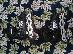 Black qnd white inline skates for sale