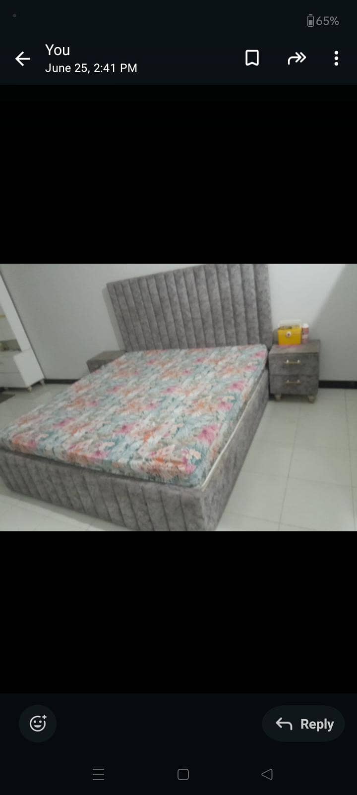 A king size bed with two side tables 1