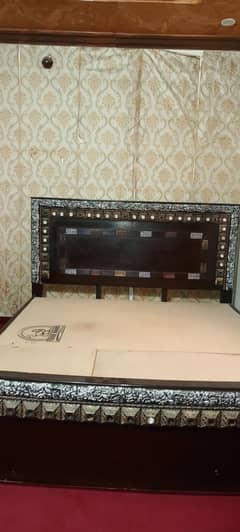 Wooden dark brown colour king size full bed with good condition