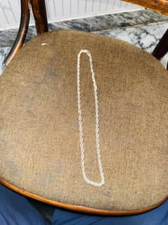 Silver chain weight 40 g = 3.43 Tola