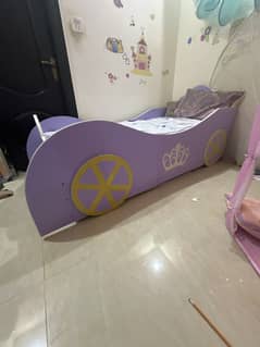princess bed for girls with a side table