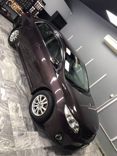 Toyota GLI 2014 model red vine colour