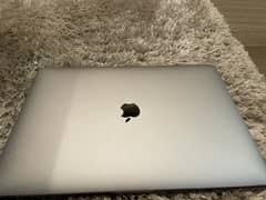 Macbook pro 2016 15 inch touch bar 8.5/10 condition genuine read add