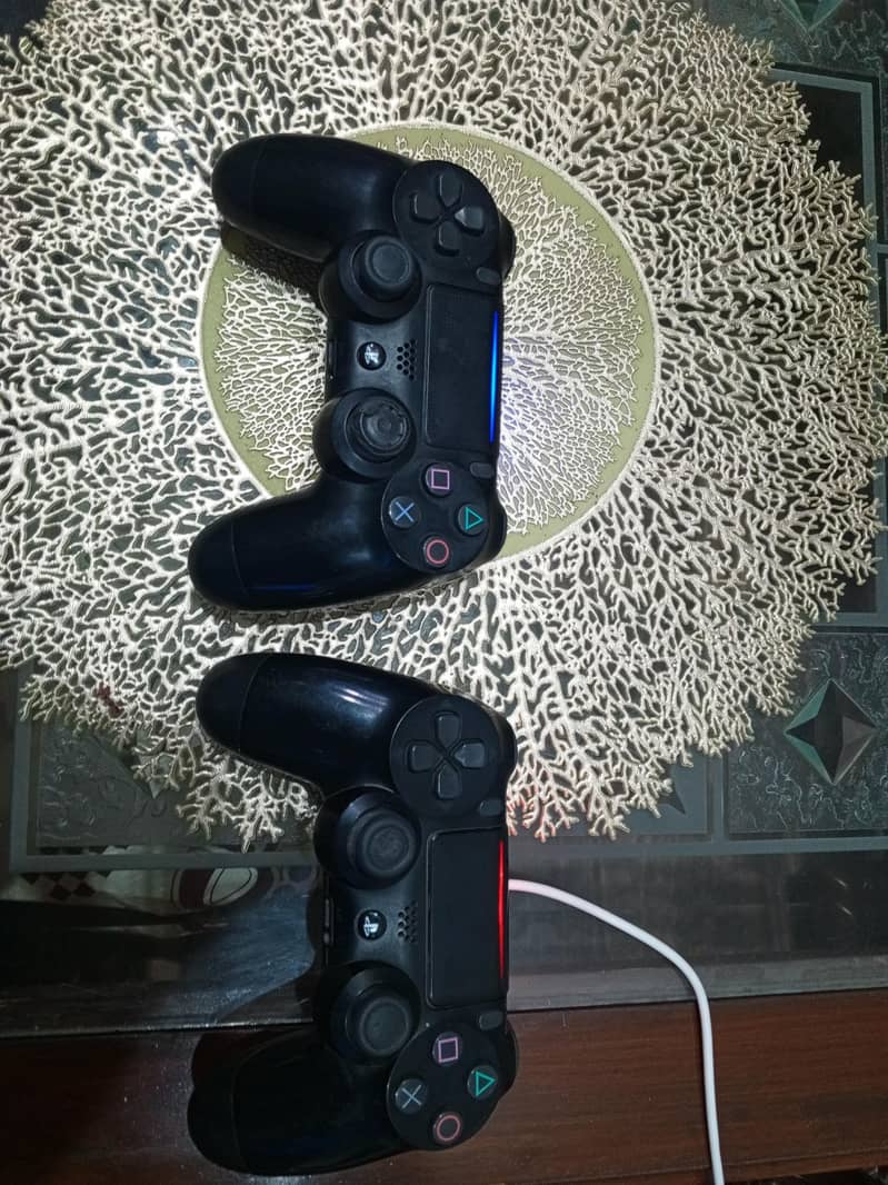ps4 fat 5 DVDs two original controllers with ps plus extra one year 3