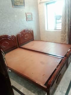 2 WOODEN SINGLE BEDS IN VERY GOOD CONDITION