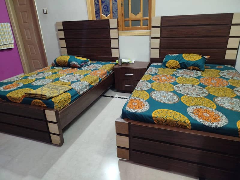 2 single bad with side tables 10/9 condition 1