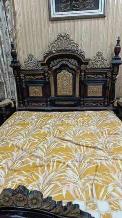 wooden bed and side tables and dressing table