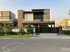 One Kanal Brand New Luxury Ultra-Modern Design Most Beautiful Fully Furnished Bungalow 2 Servant Quarter In Basement For Sale At Prime Location Of DHA Lahore Near To Park Masjid & DHA Raya Fairways Commercial.